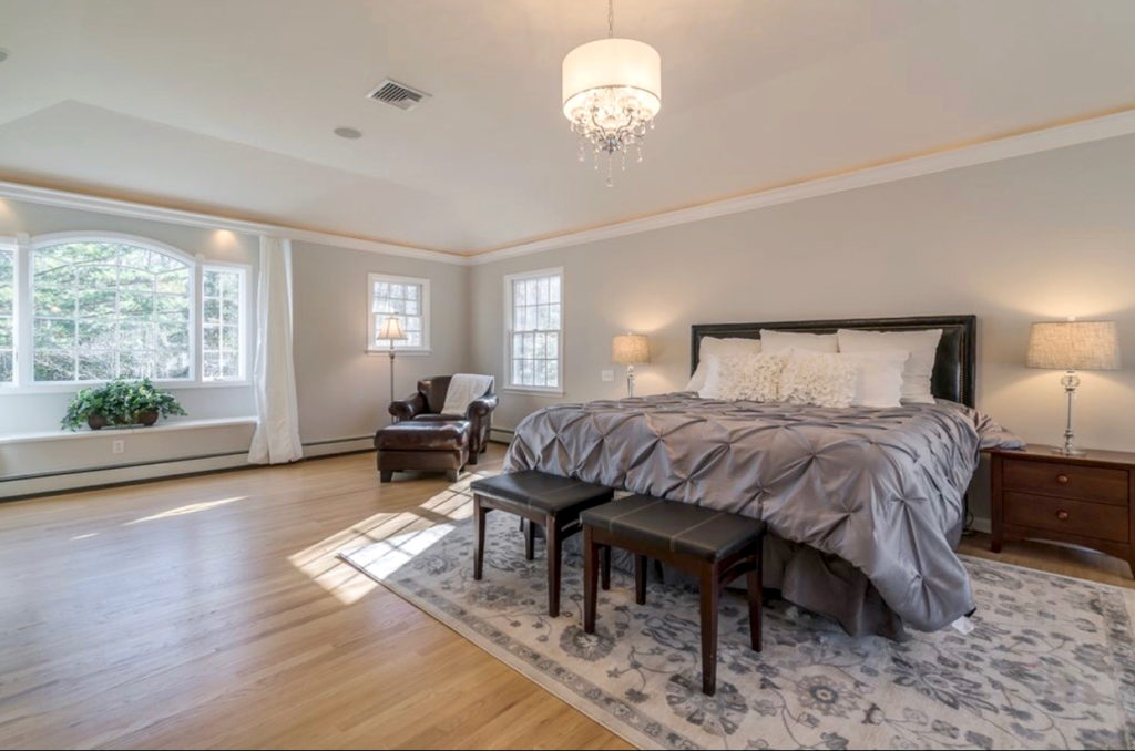 Designed to sell, taupe traditional master bedroom